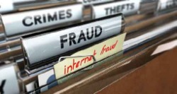 stack of file folders that say fraud, crimes, internet fraud